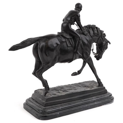 103 - After Mene, a bronze study of a jockey on horseback raised on a black marble base, 37cm in length.