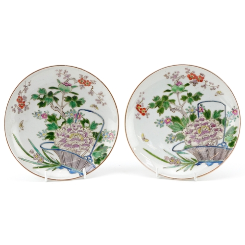 463 - A pair of Chinese famille rose porcelain circular dishes, each with hand painted enamelled decoratio... 
