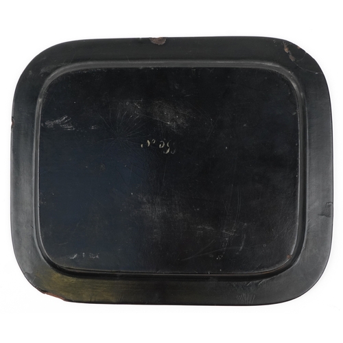 1653 - A late Victorian black lacquered rectangular tray with gilt decoration, 31cm wide.