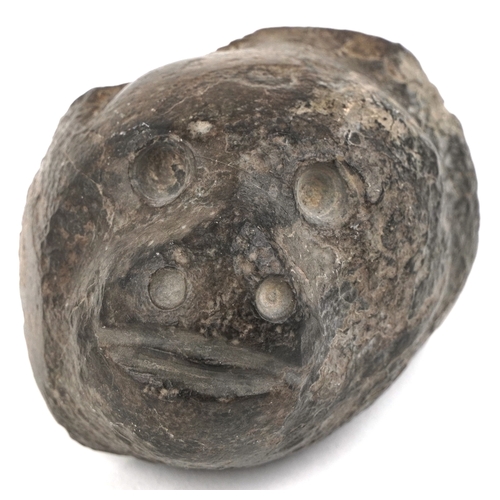 1684 - A carved stone bangle, possibly African Dogon tribe, 10cm in diameter together with a stone fragment... 