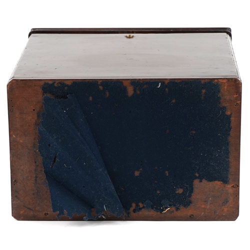 1512 - A late George III mahogany decanter box, the hinged lid revealing six divisions, with applied brass ... 