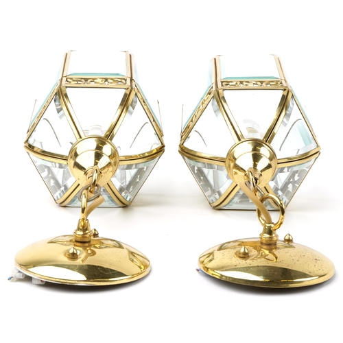 319 - A pair of gilt brass hanging lantern light fittings with bevelled glass panels, 45cm high.