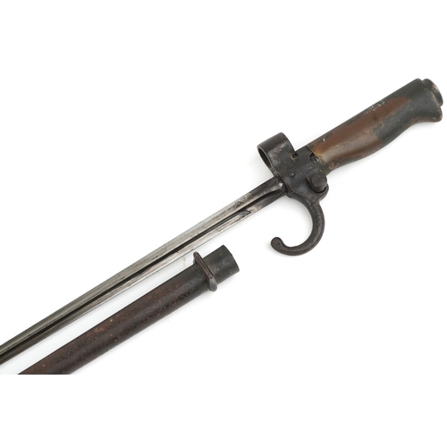 2851 - A French military interest bayonet and scabbard with cross blade, the handle and scabbard numbered 8... 