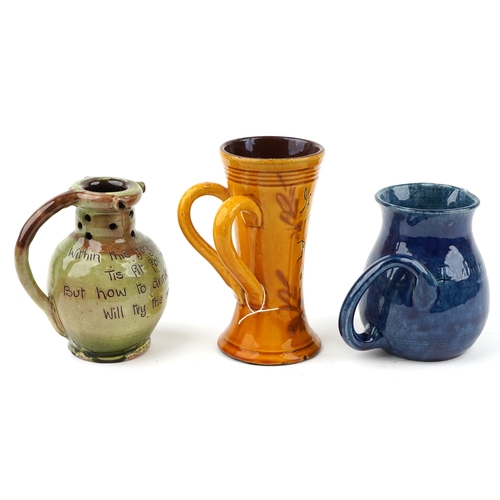 448 - Three pottery vessels including a Baron Barnstaple puzzle jug and Ewenny pottery jug, the largest 19... 