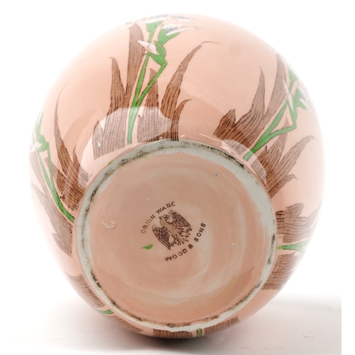 331 - A Frederick Rhead Orion Ware vase and cover for Wood & Sons, 23.5cm high.