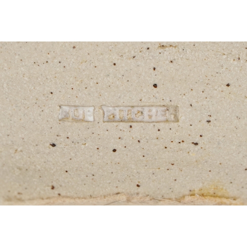 476 - A novelty studio pottery candleholder in the form of a castle, impressed Sue Pritchard to the revers... 