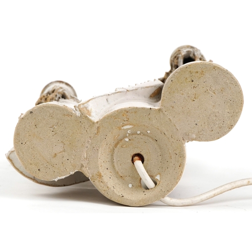 475 - A studio pottery novelty table lamp base in the form of a castle, possibly by Sue Pritchard, 41cm hi... 