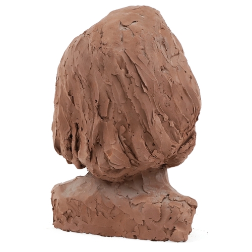 115 - A 20th century plaster head and shoulders portrait bust of a woman, 33cm high.