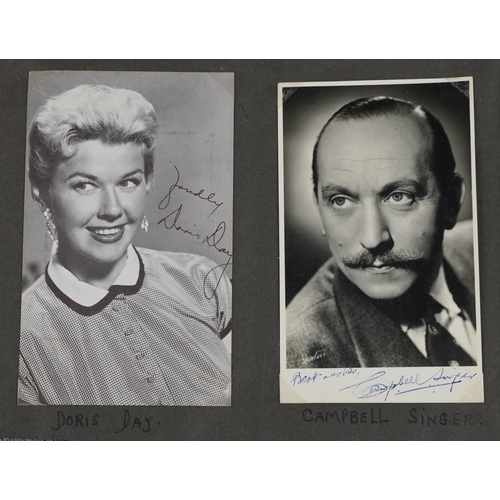 1293 - A large collection of 1950s signed/autographed photographs of film stars and musicians including Shi... 
