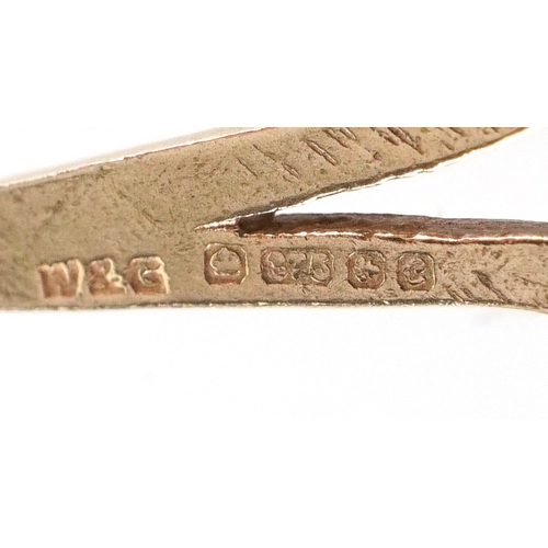 3304 - A 9ct gold garnet and diamond cluster pendant on a 9ct gold necklace, 2.6cm high and 48cm in length,... 