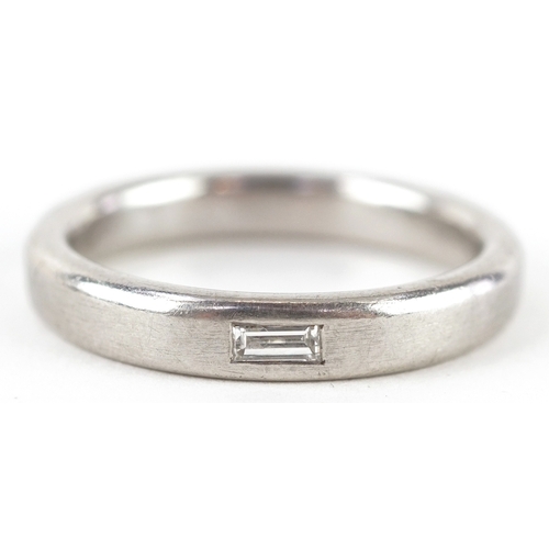 3372 - A platinum and baguette cut diamond ring, size U, 12.0g.