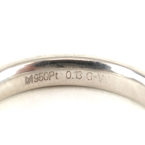 3372 - A platinum and baguette cut diamond ring, size U, 12.0g.