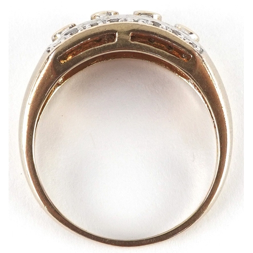 3133 - A 9ct gold diamond three row ring, size Q, 3.9g.