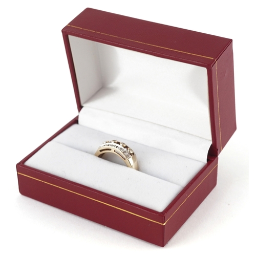 3133 - A 9ct gold diamond three row ring, size Q, 3.9g.