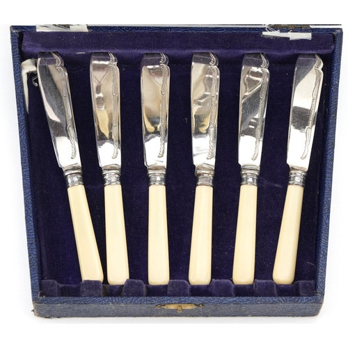 3748 - A set of six fish knives and forks with silver collars and silver plated blades housed in a fitted c... 