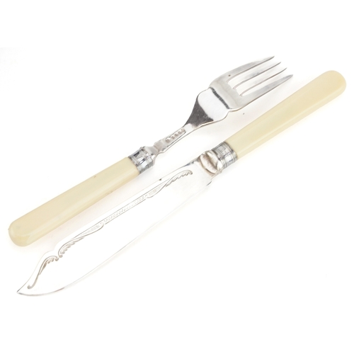 3748 - A set of six fish knives and forks with silver collars and silver plated blades housed in a fitted c... 