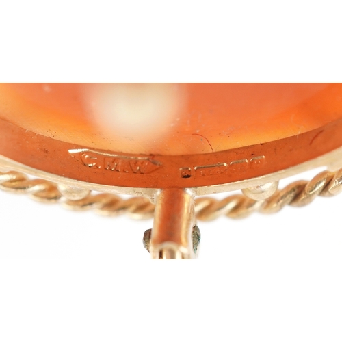 3193 - A 9ct gold mounted cameo shell brooch carved with a maiden, 2.6cm high, 3.6g.