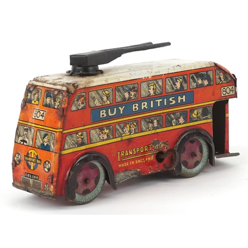 730 - A mid 20th century Wells Brimtoy tinplate clockwork trolleybus, 17cm wide.