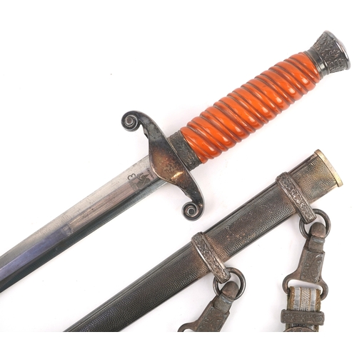2844 - A German military interest dagger with scabbard and hanger, engraved Eikhorn Solingen to the blade, ... 