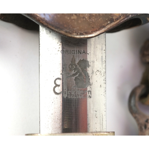 2844 - A German military interest dagger with scabbard and hanger, engraved Eikhorn Solingen to the blade, ... 