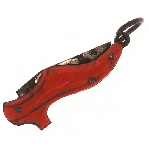 310 - A 19th century miniature folding pocket knife in the form of a shoe, 3.5cm in length.