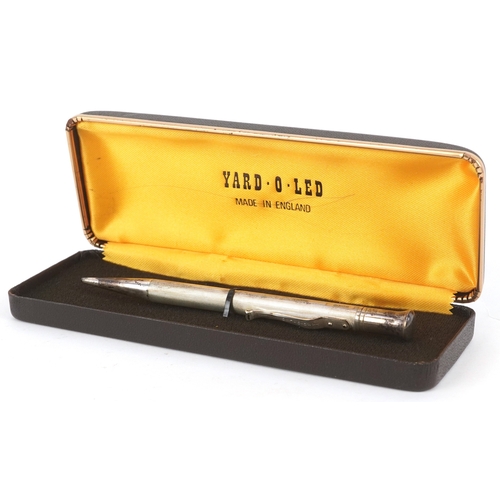 70 - A Yard-O-Led engine turned silver propelling pencil with box, 12.5cm in length.