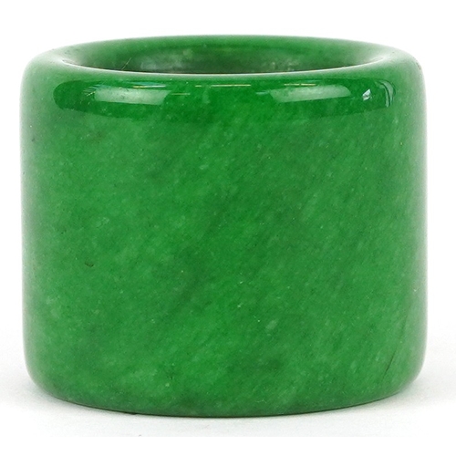 1828 - A Chinese green stone archer's ring, size Z+, 44.4g.