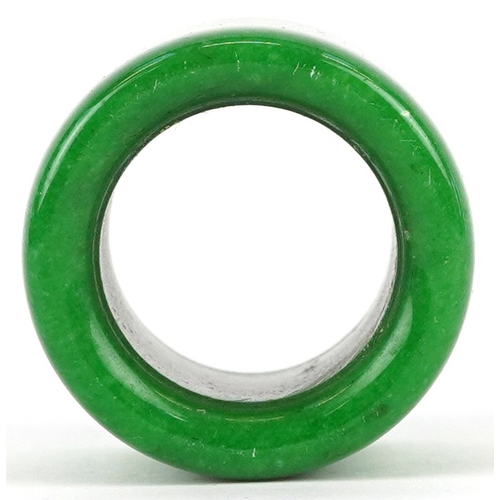 1828 - A Chinese green stone archer's ring, size Z+, 44.4g.
