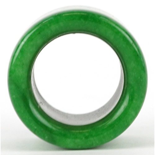 1828 - A Chinese green stone archer's ring, size Z+, 44.4g.