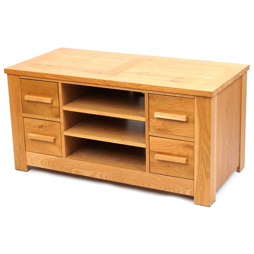 2035 - A modern oak side cabinet fitted with drawers and open shelves, 57cm H x 115cm W x 55cm D.