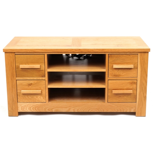 2035 - A modern oak side cabinet fitted with drawers and open shelves, 57cm H x 115cm W x 55cm D.