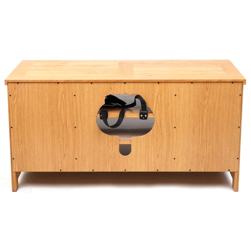 2035 - A modern oak side cabinet fitted with drawers and open shelves, 57cm H x 115cm W x 55cm D.