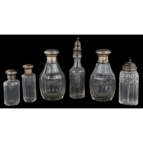 3676 - William IV and later silver mounted glassware comprising cut crystal decanters, a caster and dressin... 