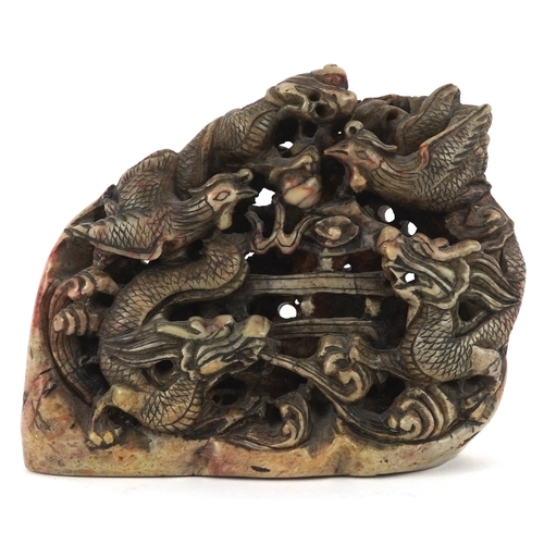 454 - A Chinese soapstone carving of dragons and mythical creatures, character marks to the base, 13.5cm h... 