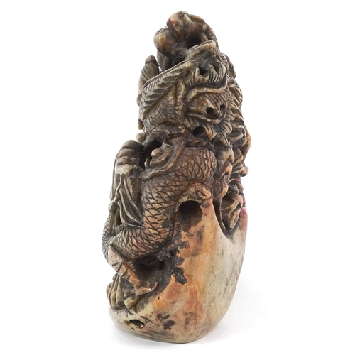 454 - A Chinese soapstone carving of dragons and mythical creatures, character marks to the base, 13.5cm h... 