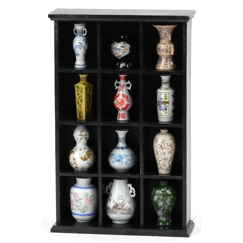 1737 - The Treasures of Imperial Dynasties by The Franklin Mint, a set of twelve miniature Japanese porcela... 