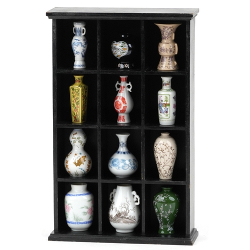 1737 - The Treasures of Imperial Dynasties by The Franklin Mint, a set of twelve miniature Japanese porcela... 