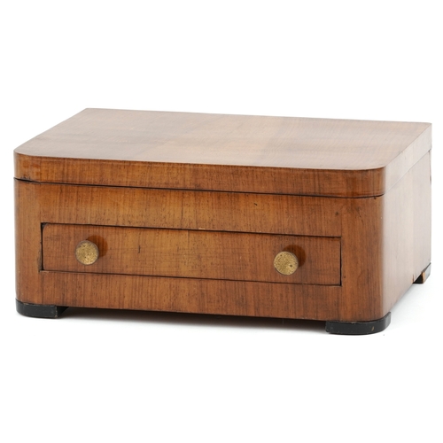 3749 - An Art Deco walnut cased canteen of stainless steel cutlery, 36cm wide.