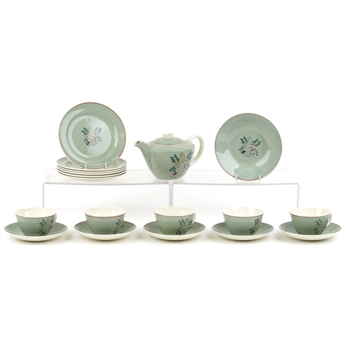 663 - A Poole pottery part tea service comprising cups, saucers, side plates and teapot, the largest 19cm ... 