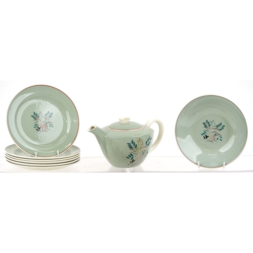 663 - A Poole pottery part tea service comprising cups, saucers, side plates and teapot, the largest 19cm ... 