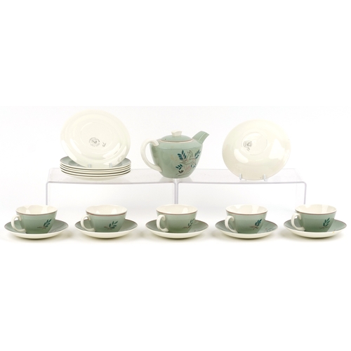 663 - A Poole pottery part tea service comprising cups, saucers, side plates and teapot, the largest 19cm ... 