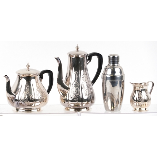 1616 - A small collection of silver plated items including an oval tray, teapot, cocktail shaker, wine coas... 