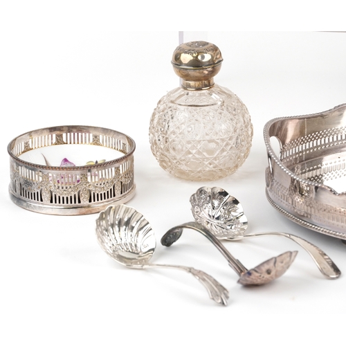 1616 - A small collection of silver plated items including an oval tray, teapot, cocktail shaker, wine coas... 
