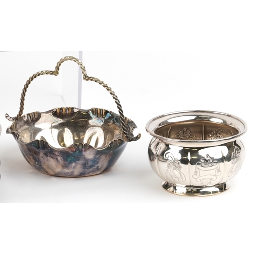 1616 - A small collection of silver plated items including an oval tray, teapot, cocktail shaker, wine coas... 