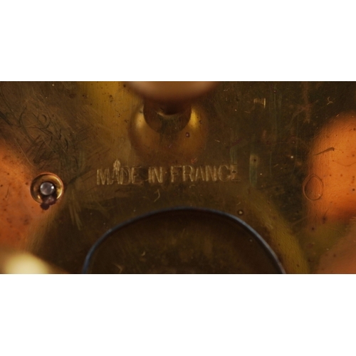 128 - An Edwardian mahogany cased mantle clock with chequer stringing, the white enamelled dial inscribed ... 