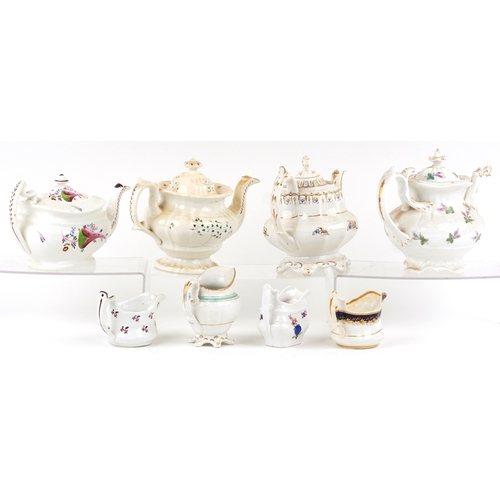 430 - 19th century English porcelain teapots and milk jugs, each with hand painted decoration, the largest... 