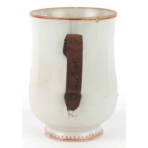 353 - A Chinese export porcelain tankard with metal handle hand painted with a European scene, 16cm high.