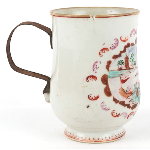 353 - A Chinese export porcelain tankard with metal handle hand painted with a European scene, 16cm high.