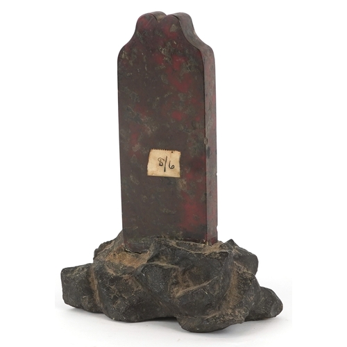 313 - A brown Penzance Cornish serpentine marble thermometer raised on a naturalistic granite base, 18cm h... 