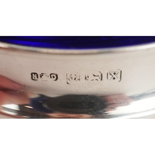 3675 - A Napper & Davenport open salt with blue glass liner and mustard spoon, Birmingham 1922 together wit... 